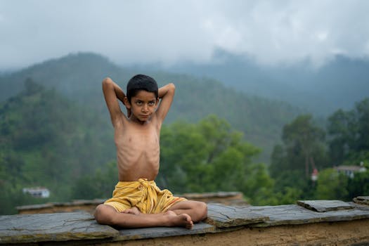 person practicing yoga outdoors