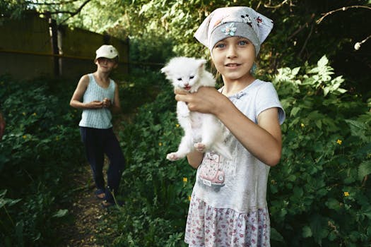 happy child observing wild animals
